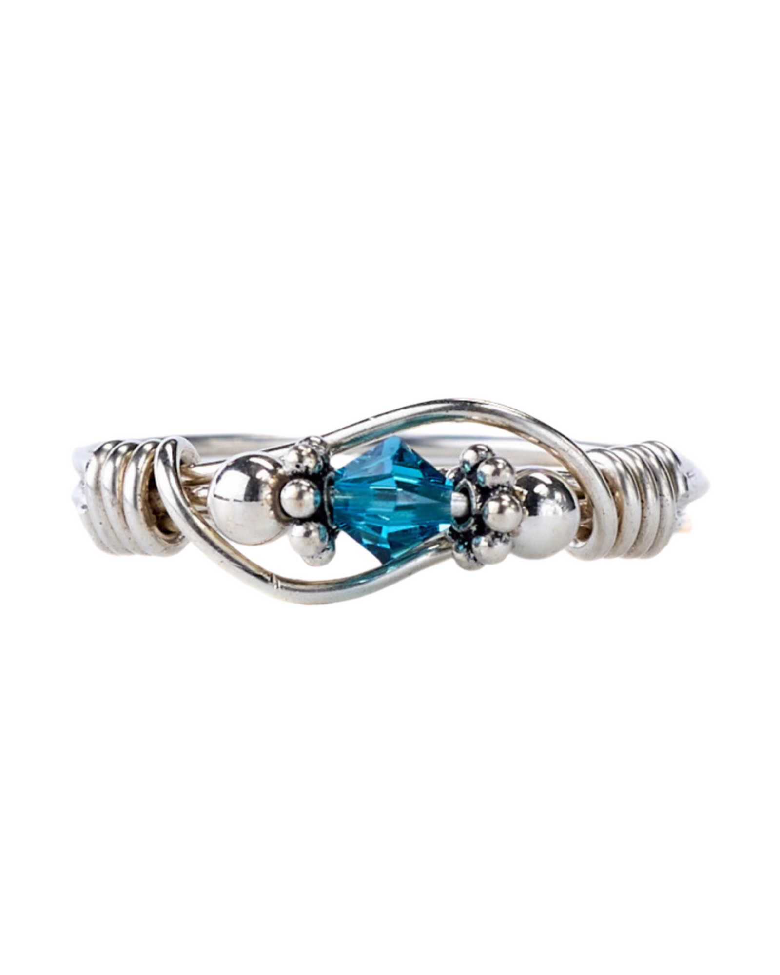 Silver ring with a blue gemstone on a white background