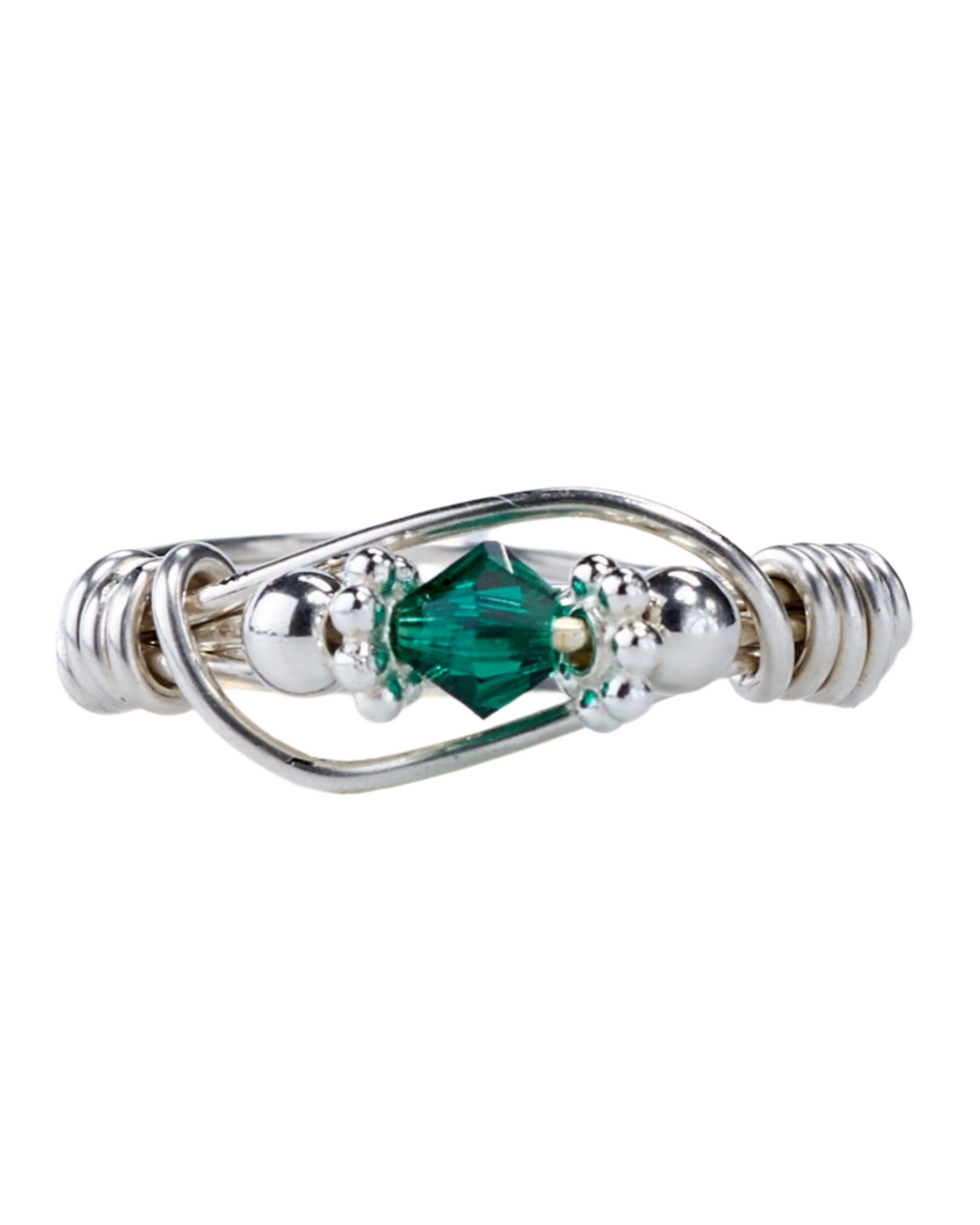 A sterling silver ring with a central green Swarovski crystal, surrounded by smaller clear crystals, and wrapped with silver beads and wire.