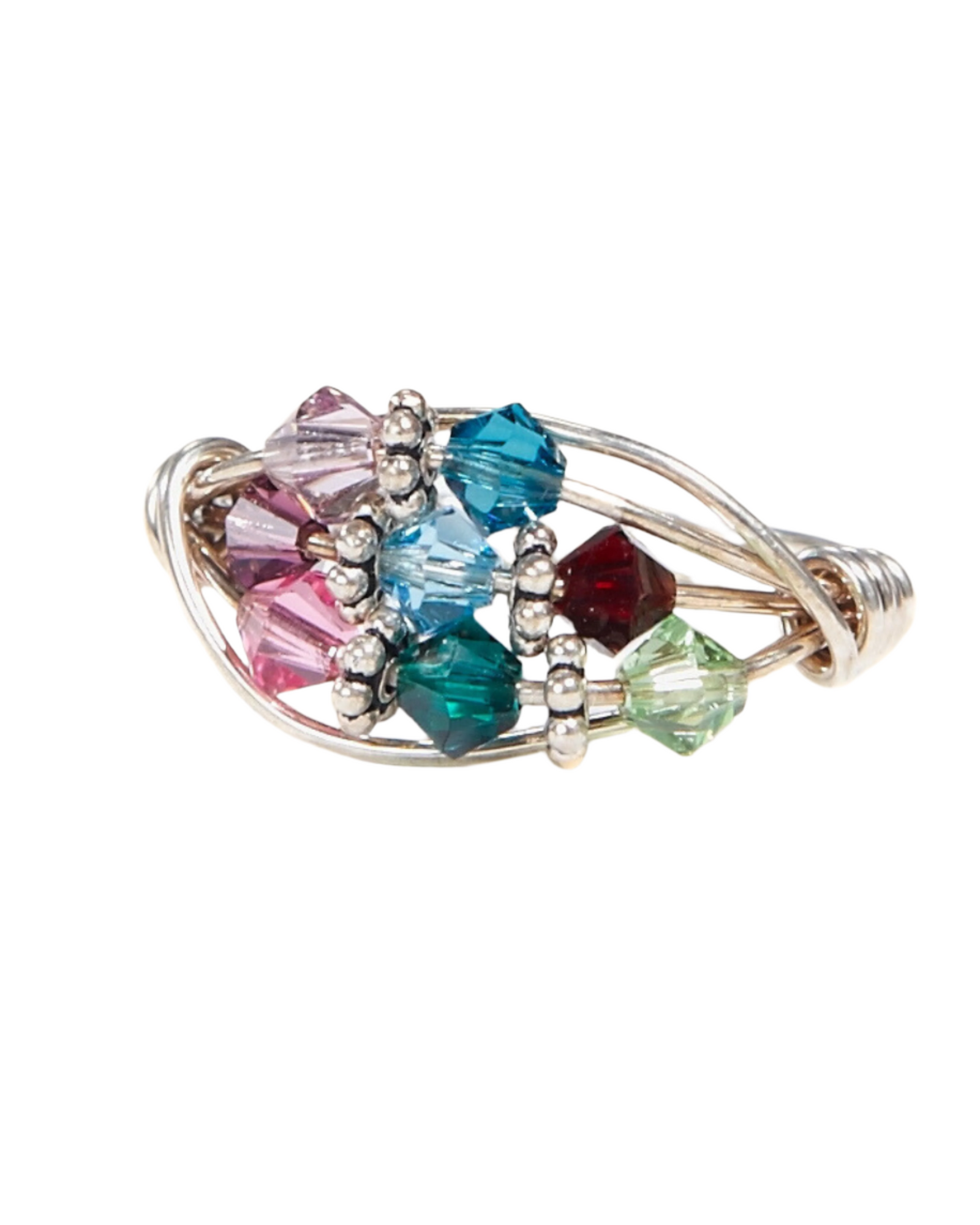 Silver ring with multicolored gemstones on a white background
