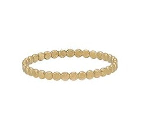 A gold-filled skinny ring with small round beads, designed for stacking.